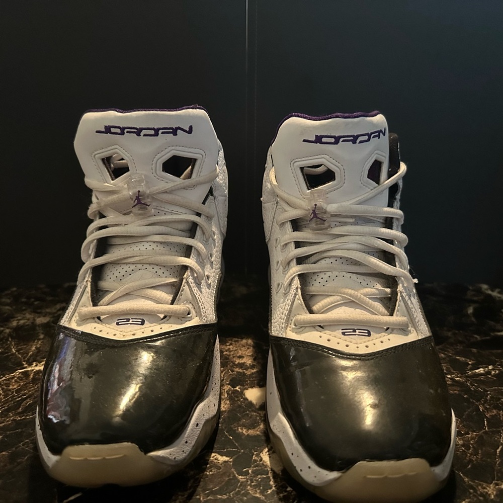 Jordan Black and White High-Tops with Purple Accents